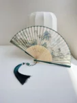 Éventail pliant de style chinois inspiré d'un panorama de rivières et de montagnes