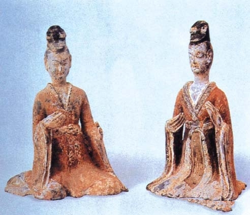 Musician dressed in a Ruqun (blouse-and-skirt ensemble) — Northern Dynasties pottery figurine (extant artifact).